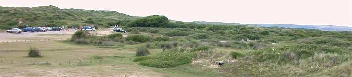 Car Park at Braunton Burrows with the dune system in the background