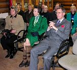 HRH The Princess Royal, her Lady-in-Waiting & the Lord  Lieutenant watch an IT presentation about the work of the Woodland Education Centre.