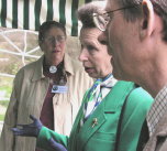 Secretary of Offwell Environment Link Mrs Gill Graham presents a  display of their work to HRH The Princess Royal.