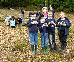 Children from a local school await the arrival of The Princess Royal .