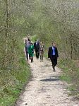 The Princess Royal is escorted along a woodland track towards the Centre's Heathland Area.