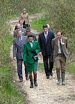 The Princess Royal is escorted along a woodland track towards the Centre's Heathland Area.