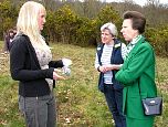 'A' Level student from Axe Valley Community College discusses her plant survey work on the Trust's heathland with HRH The Princess Royal.