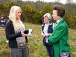 'A' Level student from Axe Valley Community College discusses her plant survey work on the Trust's heathland with HRH The Princess Royal.