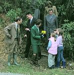 HRH The Princess Royal is presented with flowers from local children.